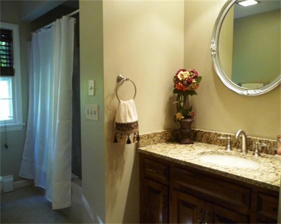 111 Scully Road Somers, CT 06071 - Photo 12 of 26 a bathroom with a sink and a mirror