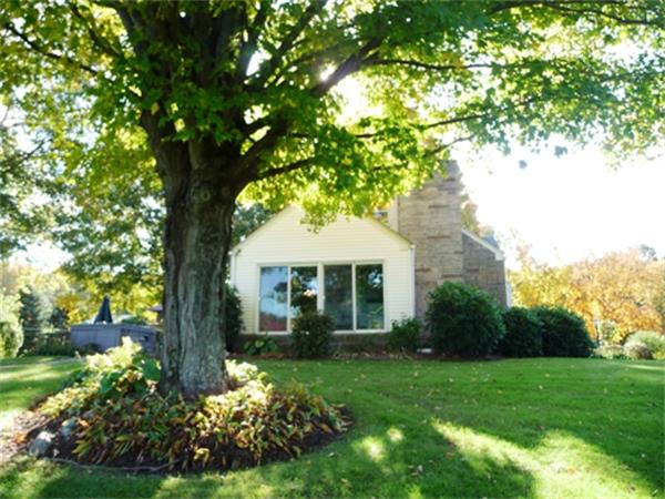 111 Scully Road Somers, CT 06071 - Photo 20 of 26 a front view of a house with a garden