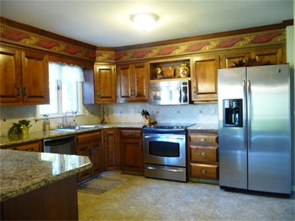 111 Scully Road Somers, CT 06071 - Photo 2 of 26 a kitchen with stainless steel appliances granite countertop a stove a sink and a refrigerator