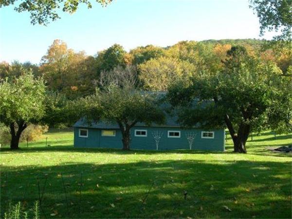 111 Scully Road Somers, CT 06071 - Photo 24 of 26 a view of a house with a yard