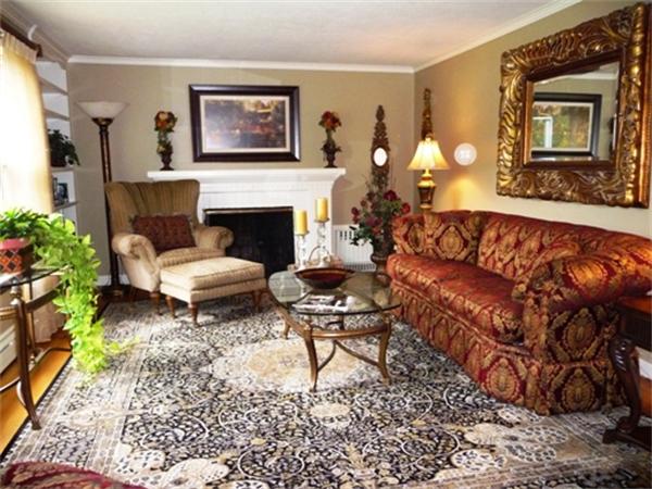 111 Scully Road Somers, CT 06071 - Photo 5 of 26 a living room with furniture and a fireplace