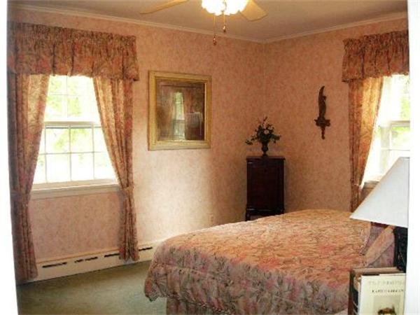 111 Scully Road Somers, CT 06071 - Photo 10 of 26 a bedroom with a bed and a window