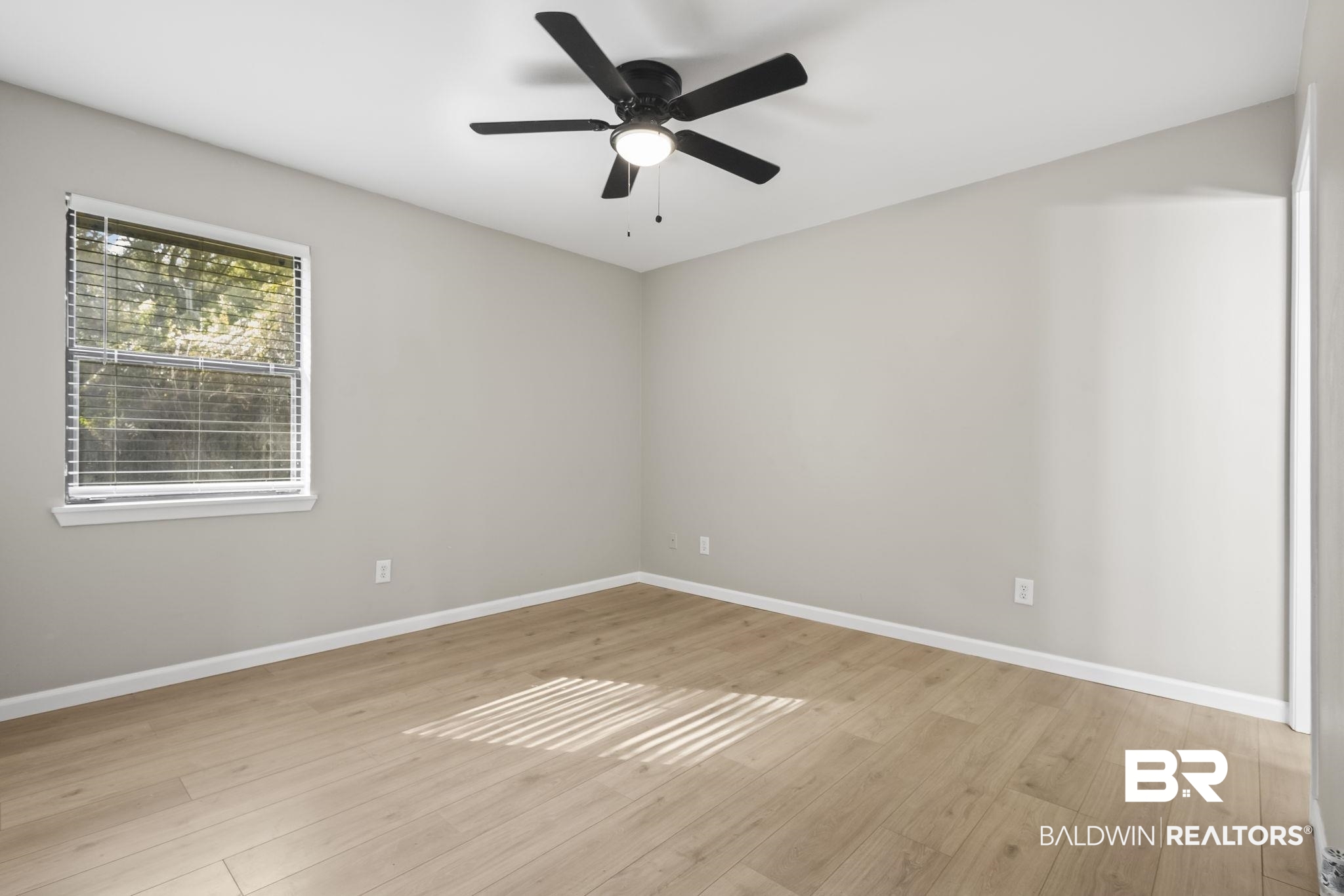 309 West Roosevelt Avenue Foley, AL 36535 - Photo 35 of 60 Spare room featuring ceiling fan and light wood-type flooring