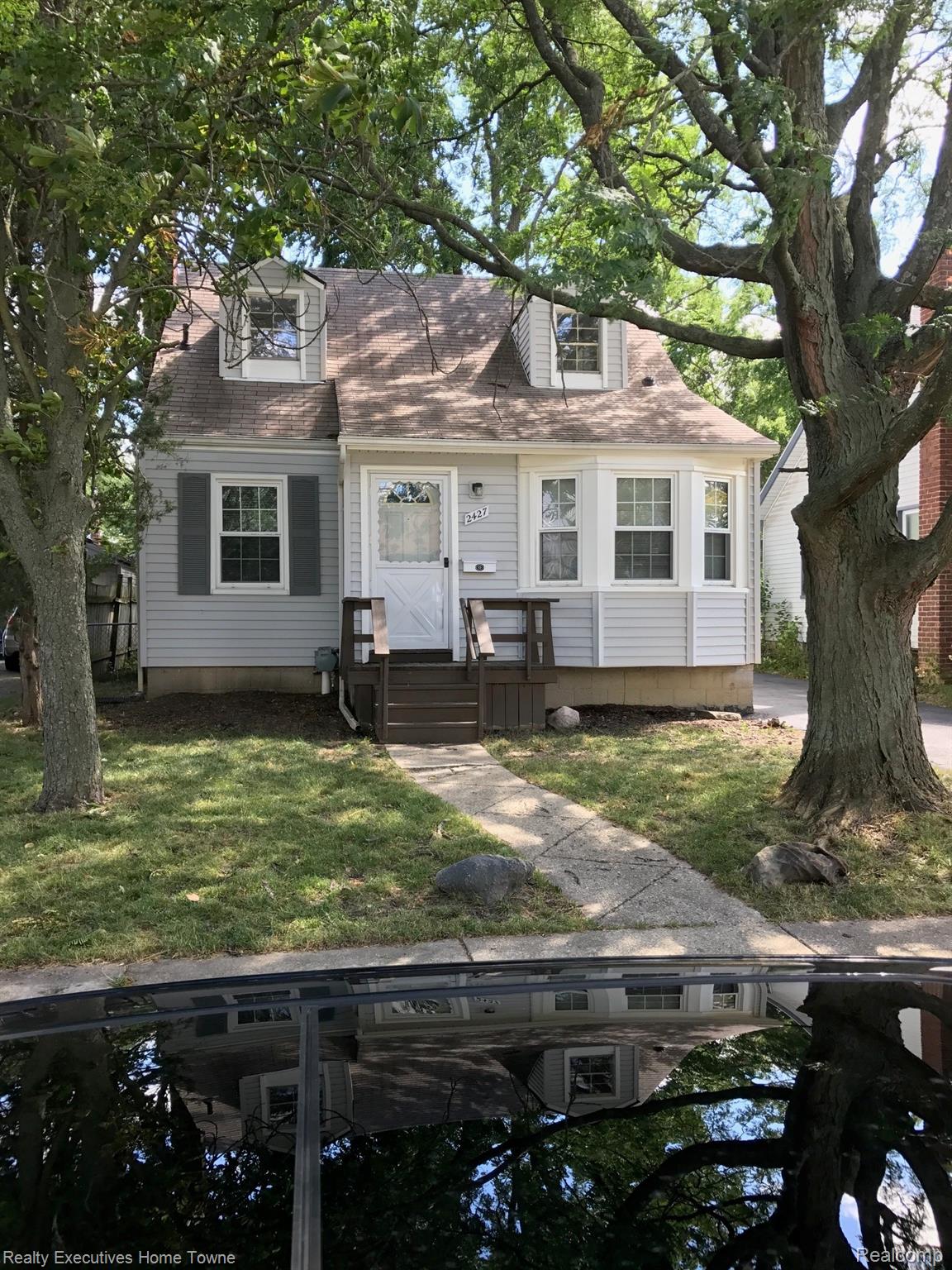 2427 Cambridge Road Berkley, MI 48072 - Photo 1 of 17 Siding exterior with dormer windows, bay window, and a front entry porch