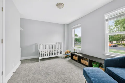 a room with furniture and wooden floor