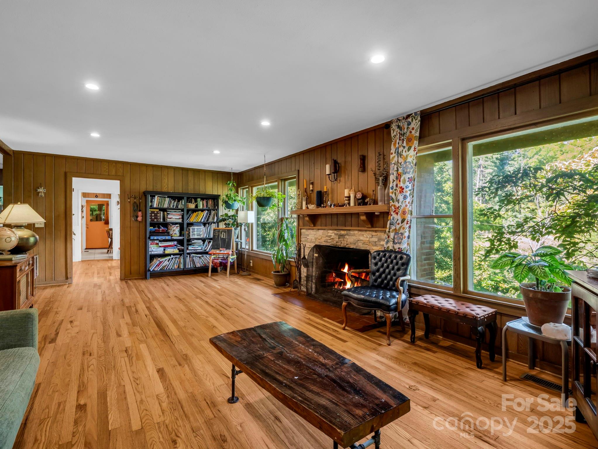 81 Jericho Drive Tryon, NC 28782 - Photo 12 of 43 a living room with furniture and a fireplace