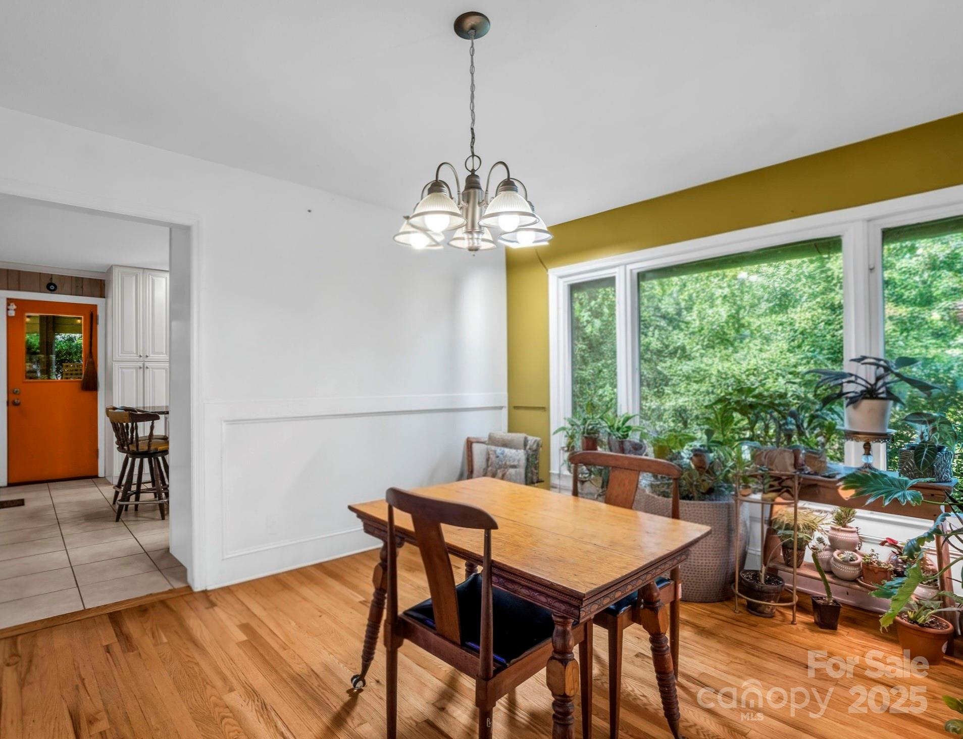 81 Jericho Drive Tryon, NC 28782 - Photo 14 of 43 a view of a dining room with furniture window and outside view