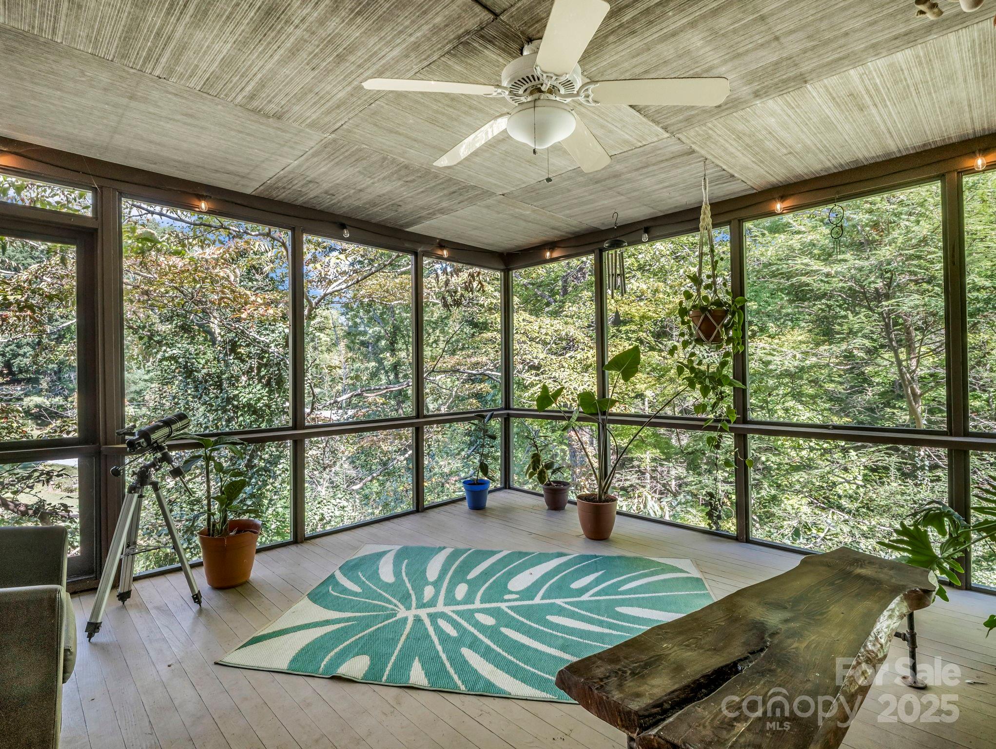 81 Jericho Drive Tryon, NC 28782 - Photo 18 of 43 a living room with large windows