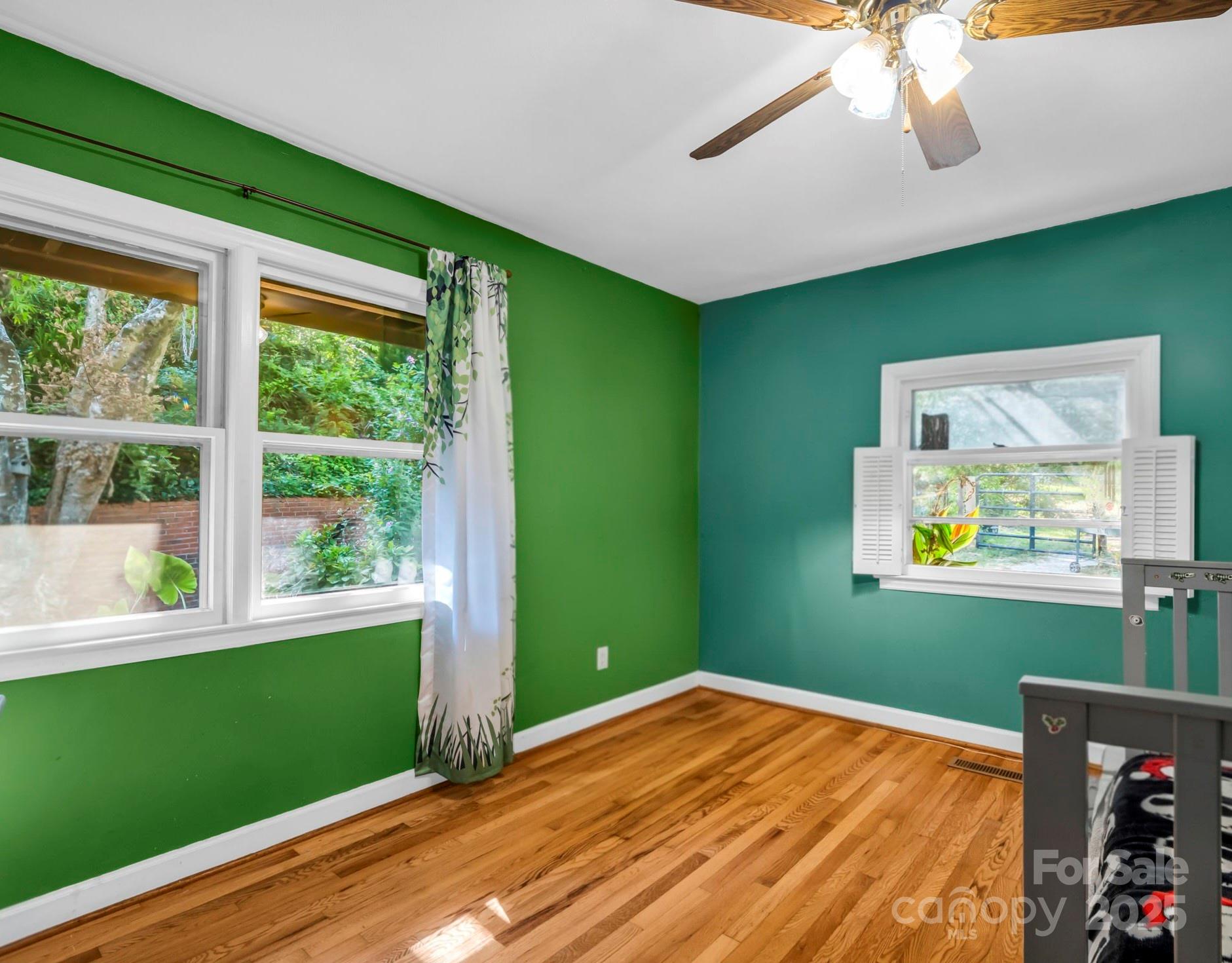 81 Jericho Drive Tryon, NC 28782 - Photo 19 of 43 a bedroom with a bed and a window