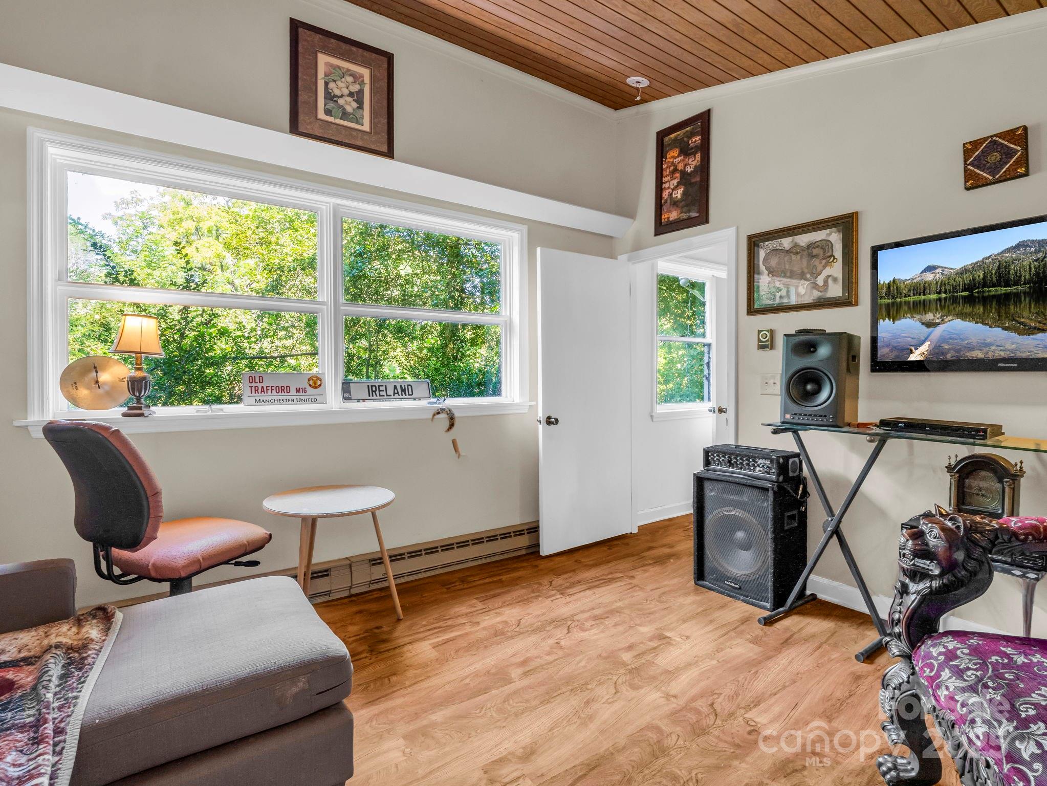 81 Jericho Drive Tryon, NC 28782 - Photo 22 of 43 a view of a livingroom with furniture and a window