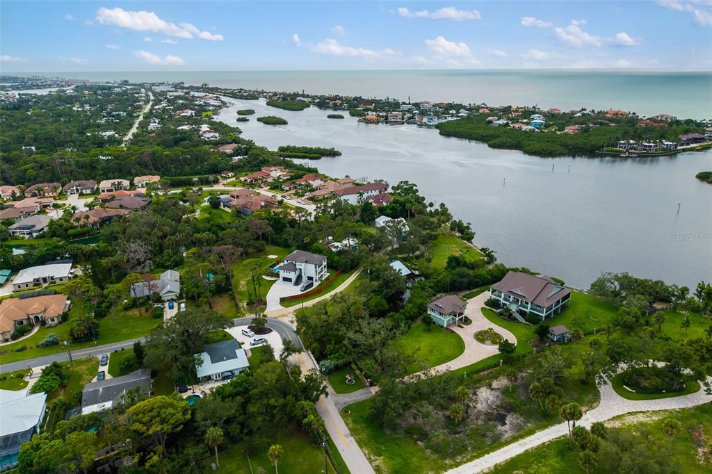 Oak Street Nokomis, FL 34275 - Photo 12 of 20 a view of a lake with a city