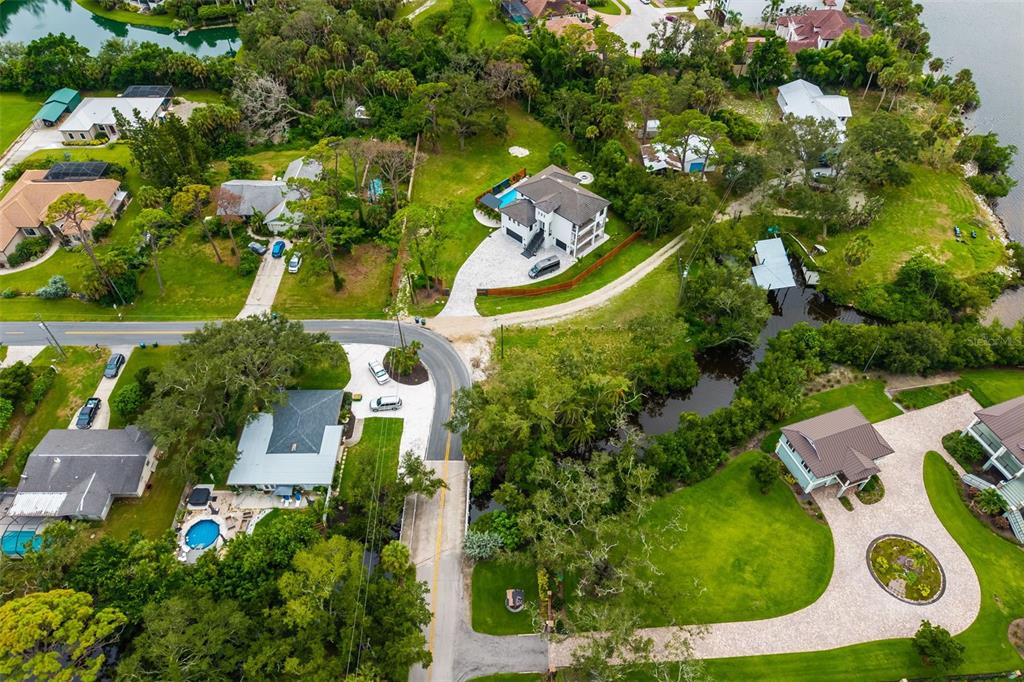 Oak Street Nokomis, FL 34275 - Photo 13 of 20 an aerial view of residential house with outdoor space and swimming pool