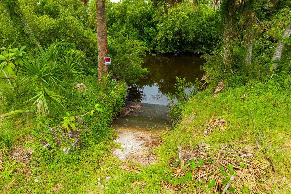 Oak Street Nokomis, FL 34275 - Photo 16 of 20 a view of a lake with a yard