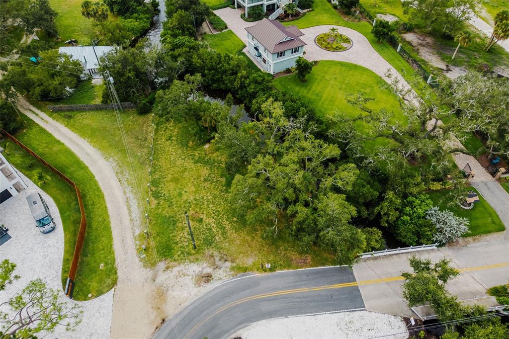 Oak Street Nokomis, FL 34275 - Photo 5 of 20 a view of swimming pool with a garden