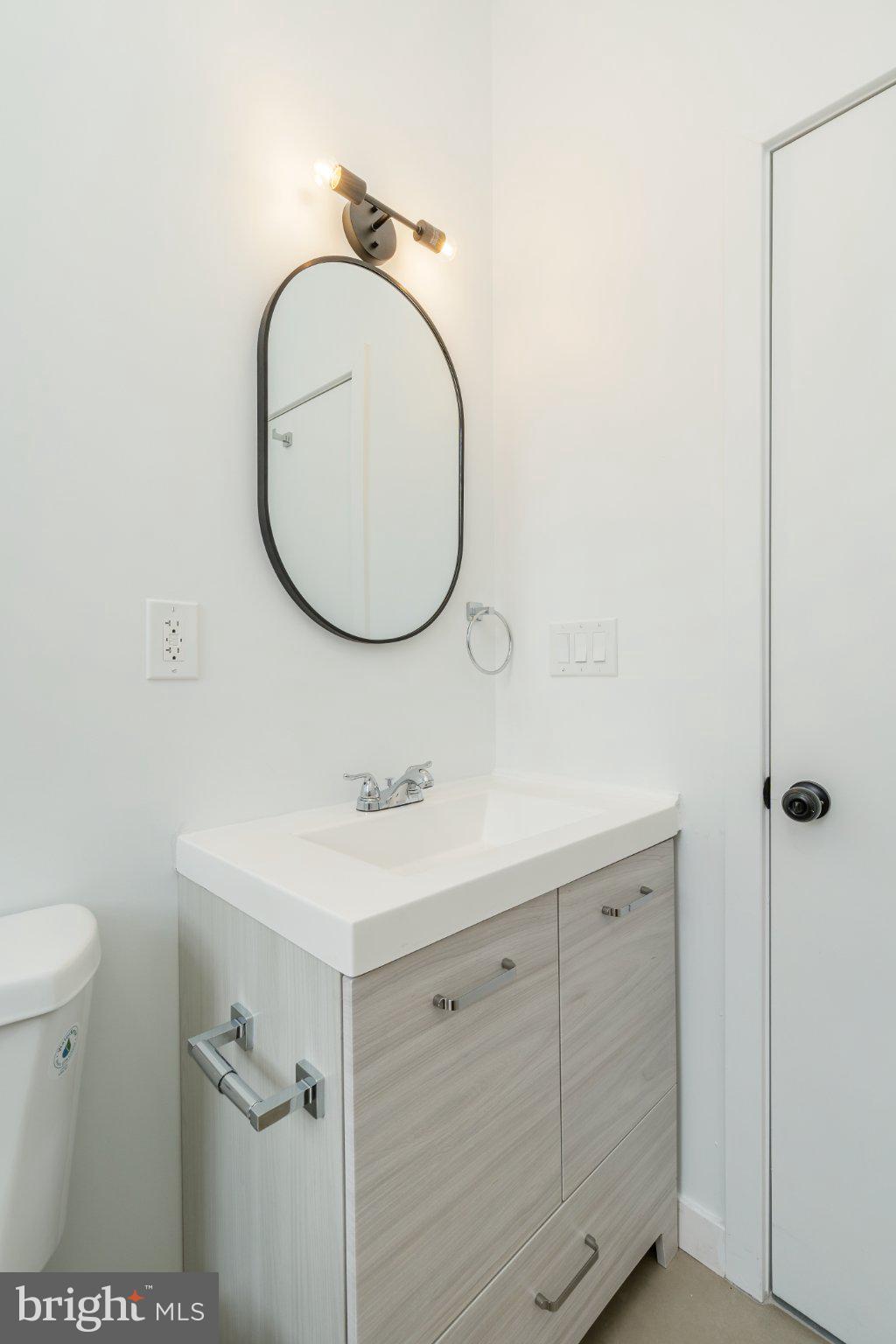 5758 Spruce Street Philadelphia, PA 19139 - Photo 18 of 44 Sleek modern bathroom with elegant fixtures.