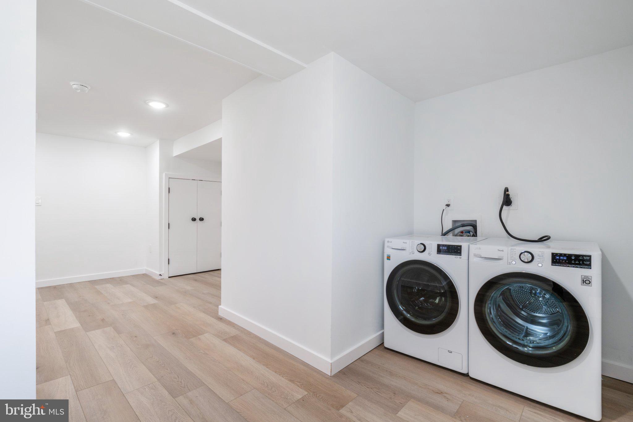 5758 Spruce Street Philadelphia, PA 19139 - Photo 21 of 44 Modern laundry space with sleek design.