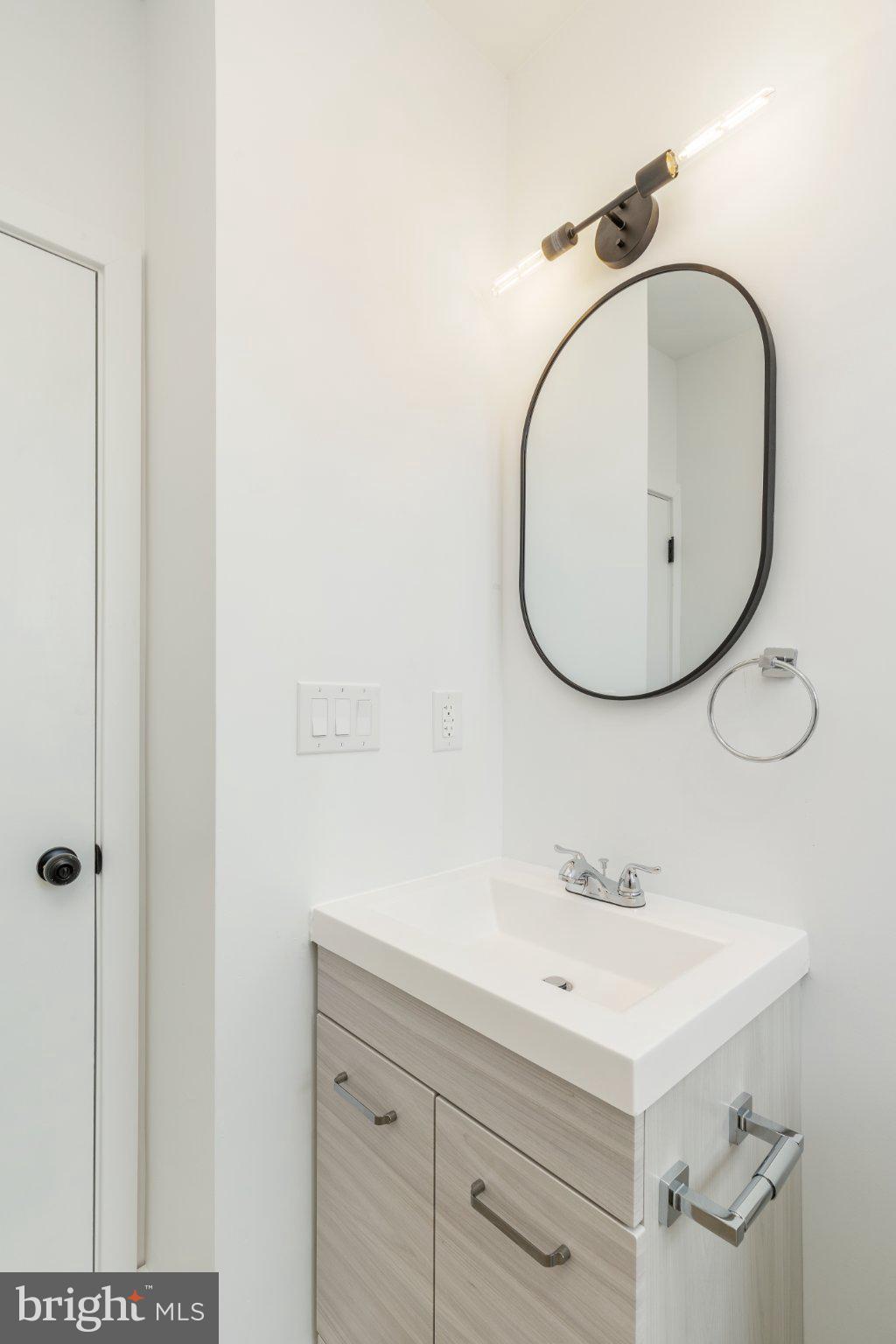 5758 Spruce Street Philadelphia, PA 19139 - Photo 30 of 44 Sleek modern bathroom with elegant fixtures.