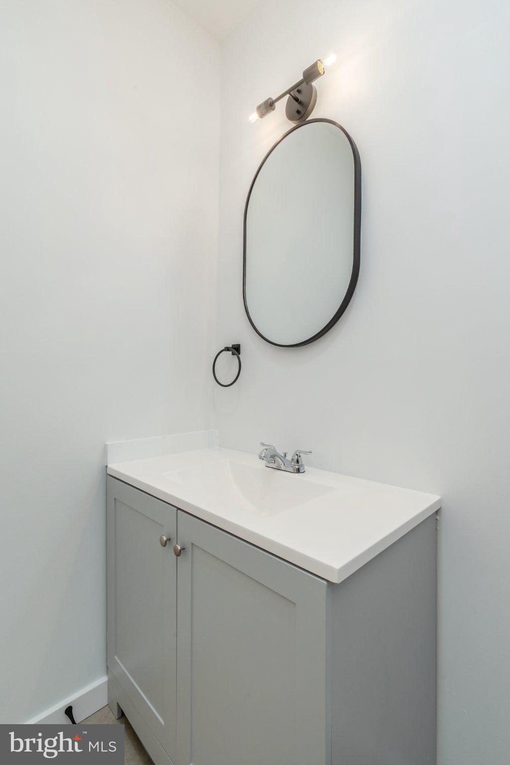 5758 Spruce Street Philadelphia, PA 19139 - Photo 35 of 44 Sleek modern bathroom with elegant fixtures.