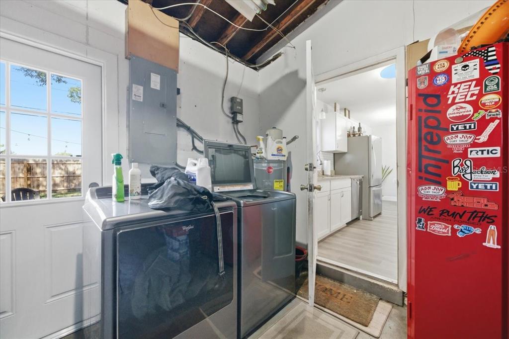 3487 Begonia Place Largo, FL 33771 - Photo 29 of 34 a room with storage and utility