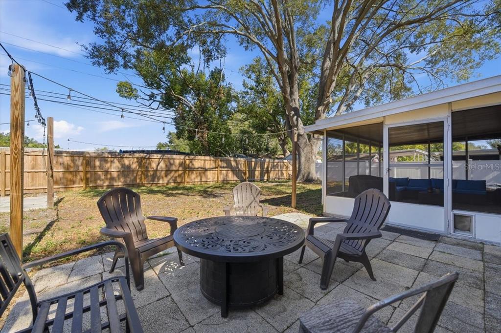 3487 Begonia Place Largo, FL 33771 - Photo 31 of 34 a view of balcony with couple of furniture and outdoor space