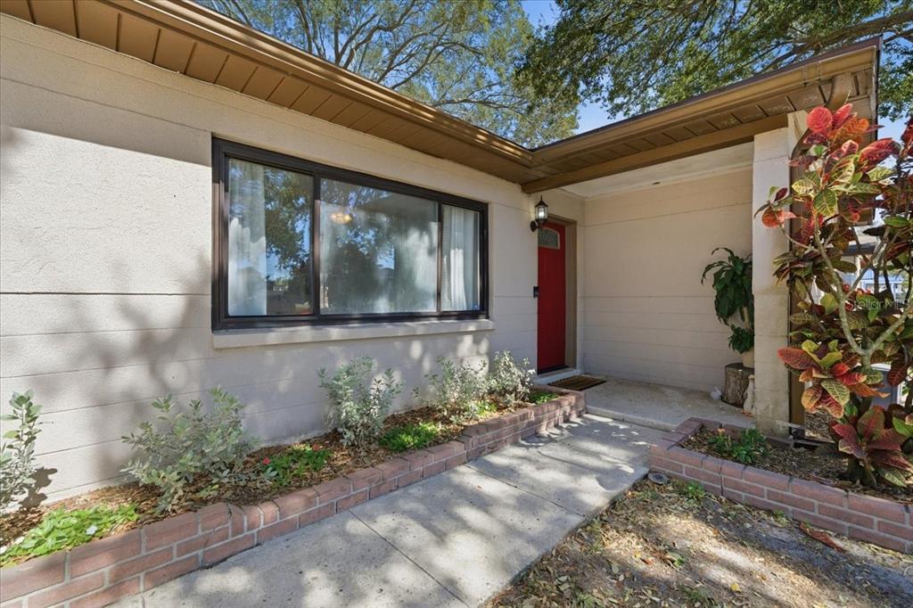 3487 Begonia Place Largo, FL 33771 - Photo 4 of 34 a front view of a house