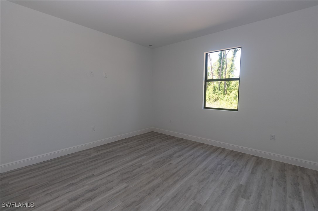 3105 Myra Lane LaBelle, FL 33935 - Photo 13 of 29 an empty room with a window