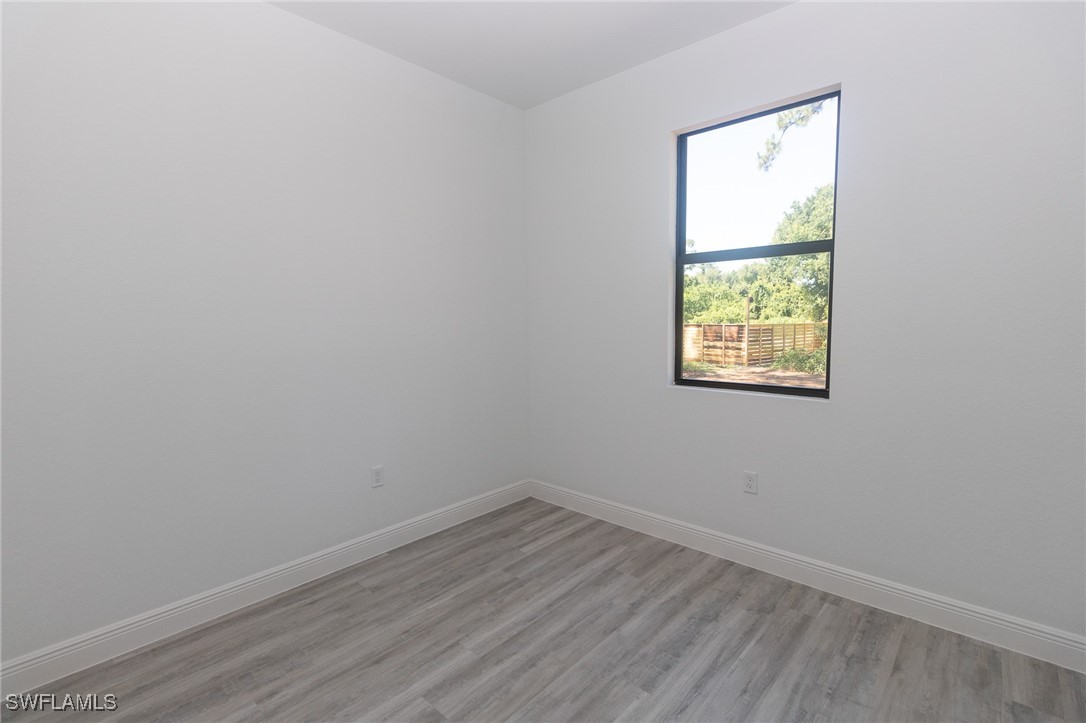 3105 Myra Lane LaBelle, FL 33935 - Photo 17 of 29 an empty room with a window
