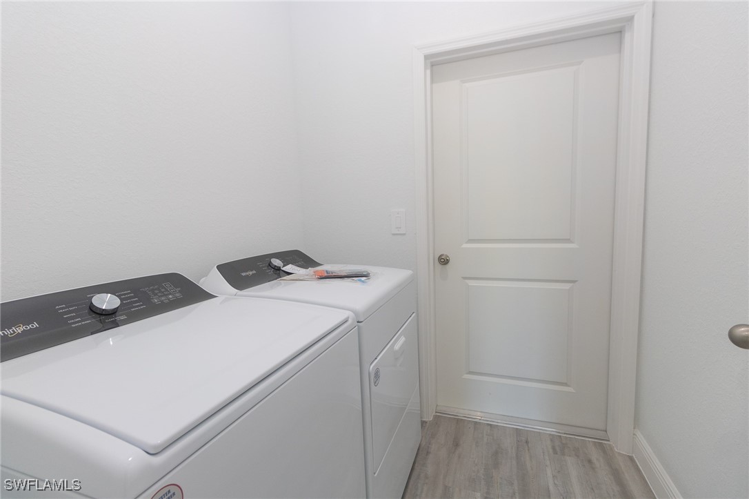 3105 Myra Lane LaBelle, FL 33935 - Photo 20 of 29 a utility room with dryer and washer