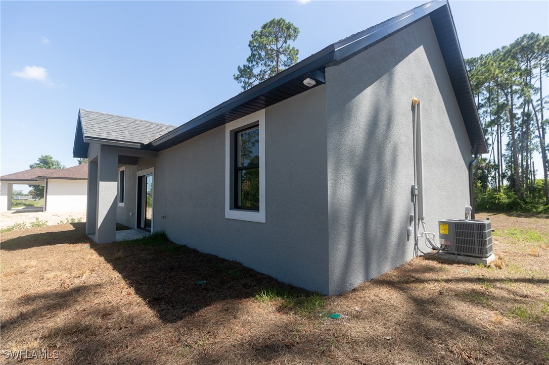 3105 Myra Lane LaBelle, FL 33935 - Photo 23 of 29 a view of a house with a yard
