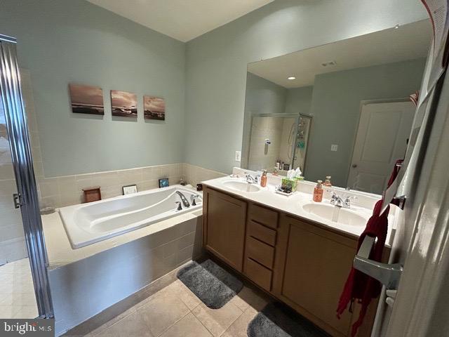8912 Tawes Street Fulton, MD 20759 - Photo 11 of 21 a view of bathroom with a sink mirror and vanity