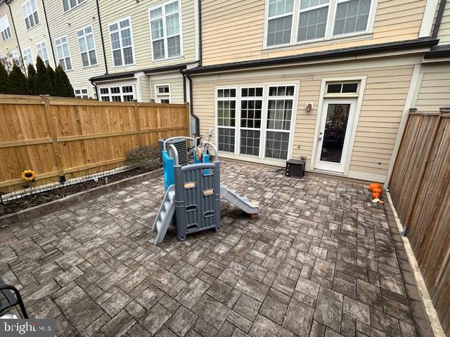 8912 Tawes Street Fulton, MD 20759 - Photo 20 of 21 a view of a patio with a table and chairs
