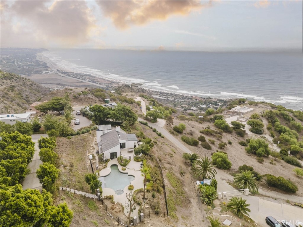 a view of ocean and mountain