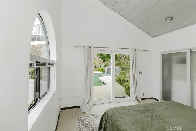 a view of a mirror with washer and dryer