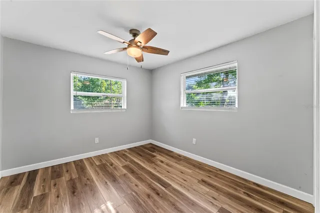 a bathroom with a toilet sink and shower