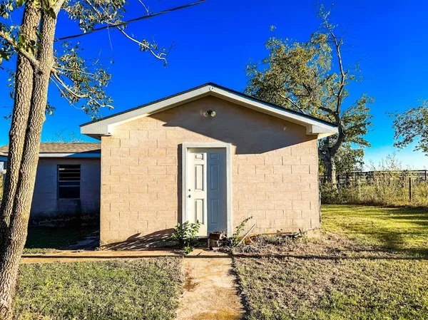 a view of empty room with retail shop and windows