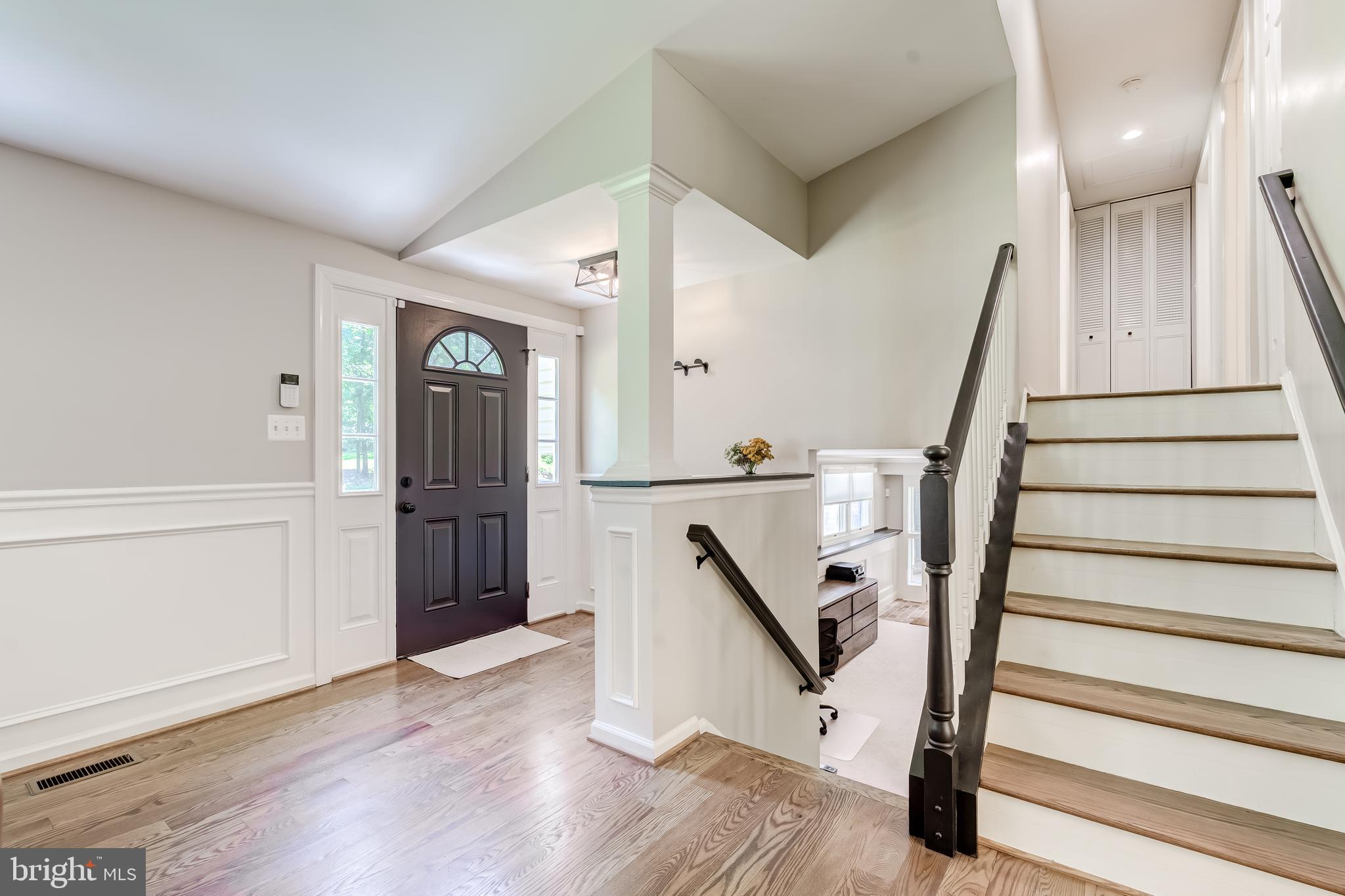 11926 Appling Valley Road Fairfax, VA 22030 - Photo 53 of 60 a view of entryway with wooden floor and stairs
