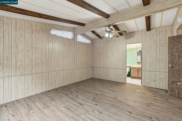 a view of a livingroom with wooden floor