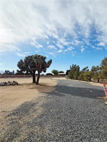 a view of street with parked cars