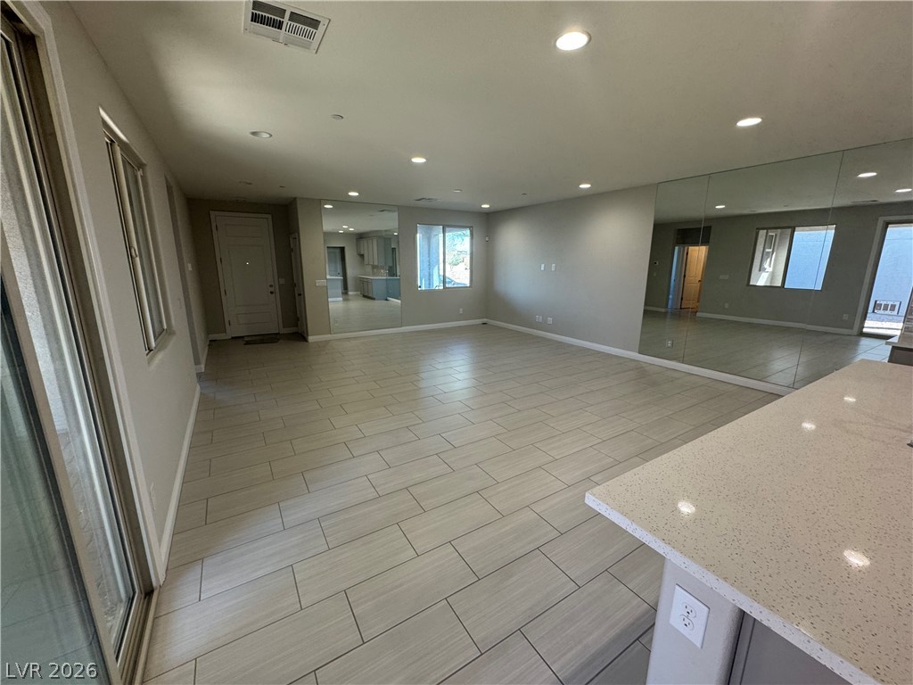 1051 East Sunset Road Henderson, NV 89011 - Photo 10 of 36 Unfurnished room featuring recessed lighting and wood finish floors