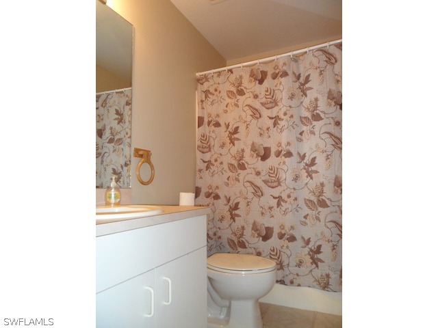 18395 Fern Road Fort Myers, FL 33967 - Photo 11 of 21 a bathroom with a sink toilet and shower
