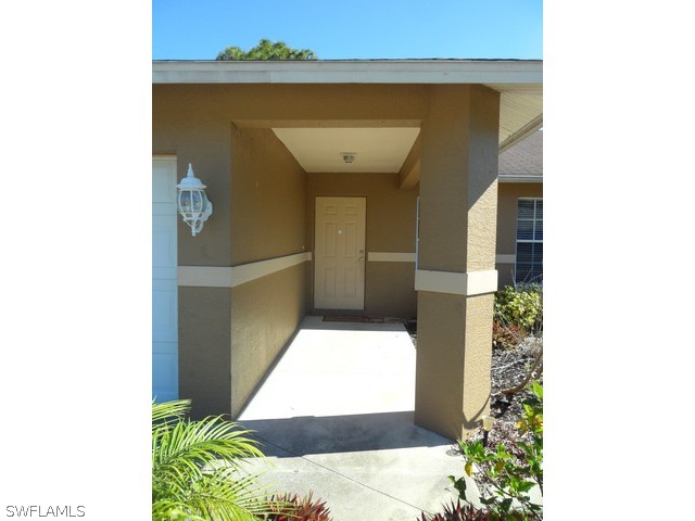 18395 Fern Road Fort Myers, FL 33967 - Photo 18 of 21 a hallway with window