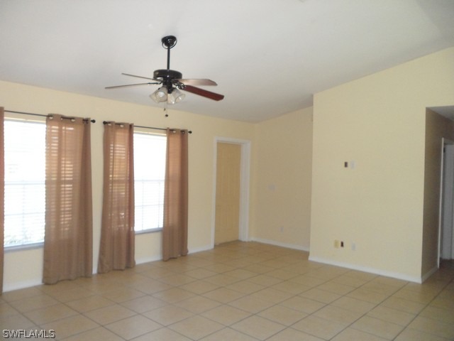 18395 Fern Road Fort Myers, FL 33967 - Photo 10 of 21 a view of a livingroom with a ceiling fan and window