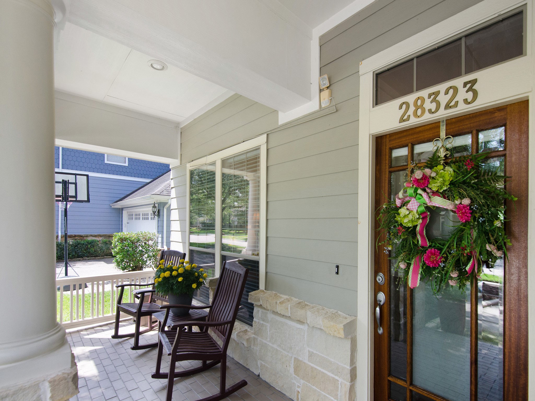 28323 Ryans Ridge Lane Spring, TX 77386 - Photo 2 of 45 The inviting covered front porch creates a warm first impression and sets the tone for the comfort and charm found throughout the home.