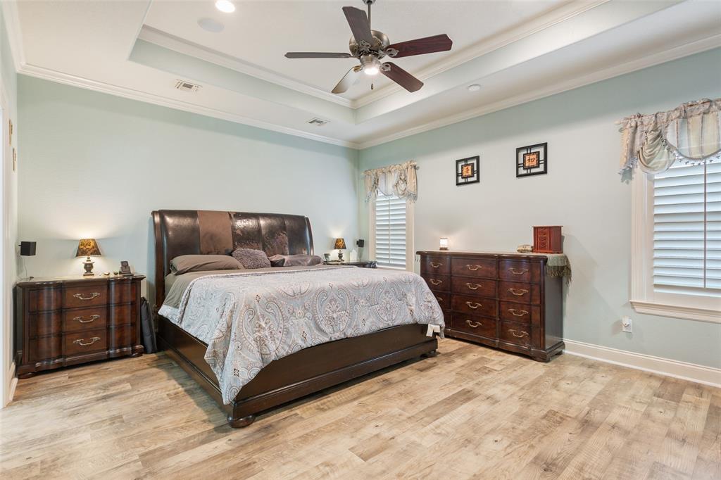 2313 Nicholas Waco, TX 76712 - Photo 14 of 36 a bedroom with a bed and wooden floor