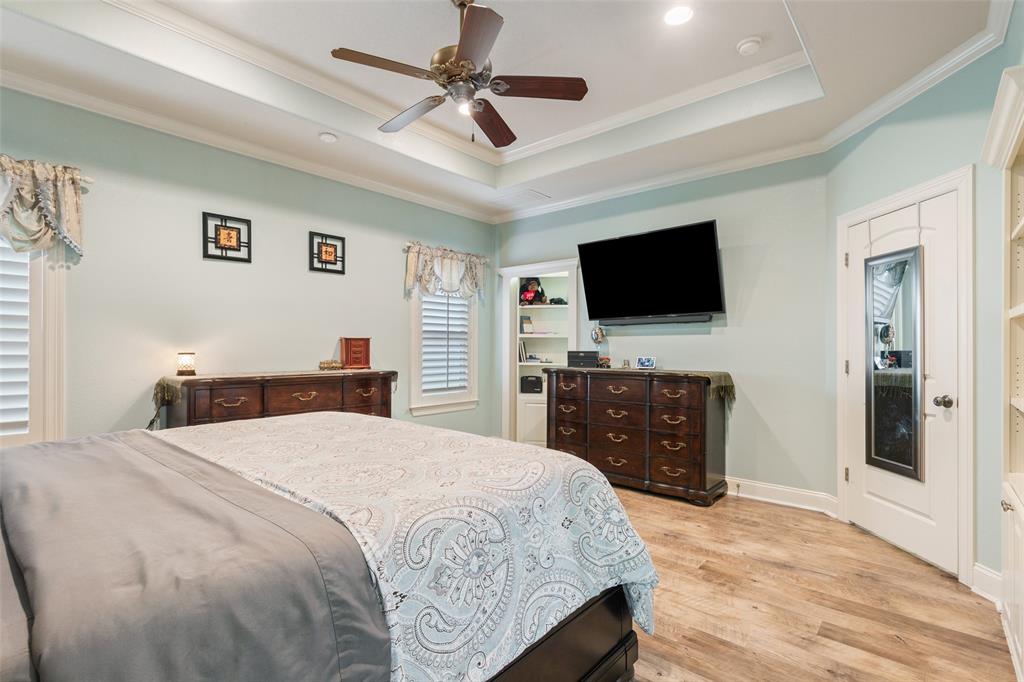 2313 Nicholas Waco, TX 76712 - Photo 15 of 36 a bedroom with a bed and a flat screen tv