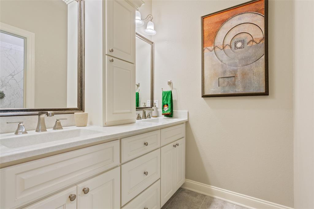2313 Nicholas Waco, TX 76712 - Photo 22 of 36 a bathroom with a sink and a mirror