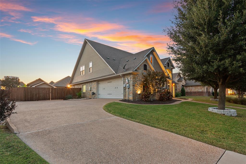 2313 Nicholas Waco, TX 76712 - Photo 36 of 36 a front view of a house with a yard and garage