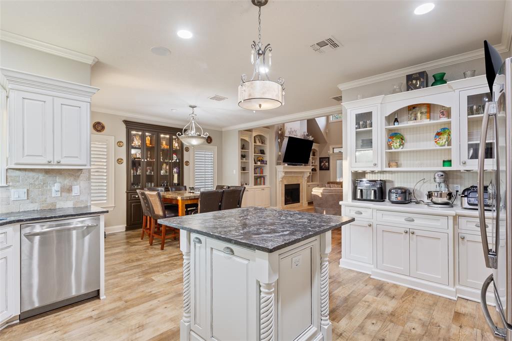 2313 Nicholas Waco, TX 76712 - Photo 8 of 36 a kitchen with stainless steel appliances granite countertop a stove oven and a refrigerator