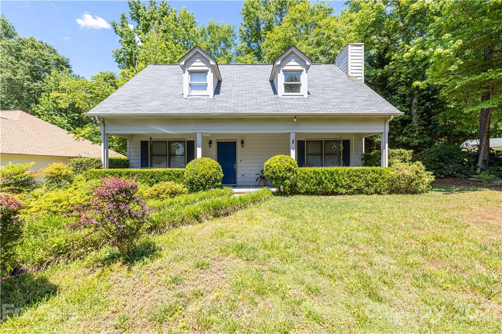 115 Banksridge Road Fort Mill, SC 29715 - Photo 1 of 29 a front view of a house with garden