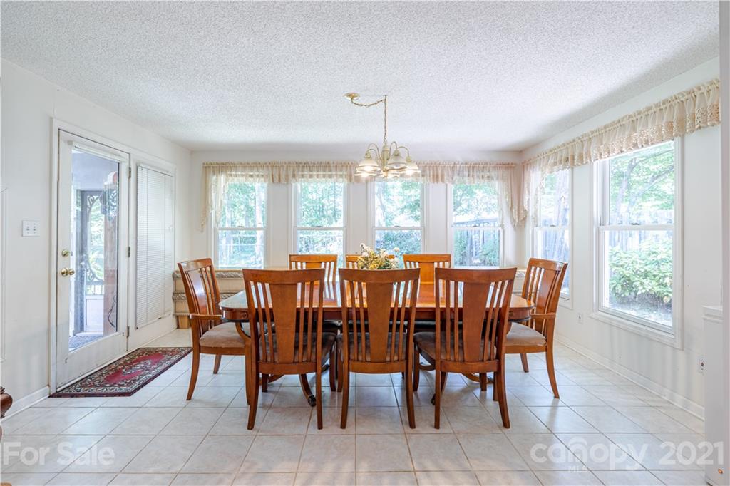 115 Banksridge Road Fort Mill, SC 29715 - Photo 18 of 29 a view of a dining room with furniture window and outside view